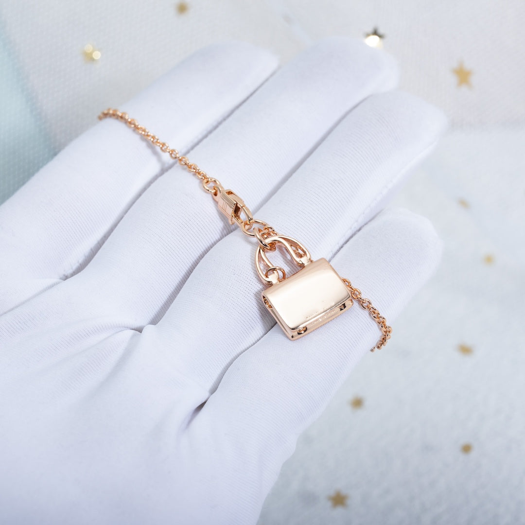 HERMES AMULETTE CONSTANCE PEDANT PINK GOLD NECKLACE