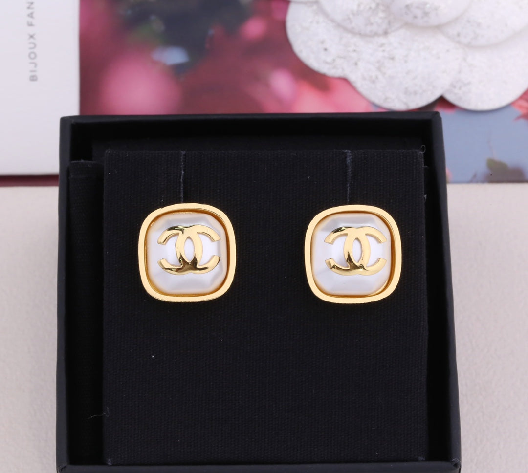 Chanel Double C Gold Mop Stud Earrings