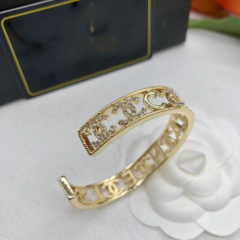 Chanel Logo Cuff Gold Bracelet