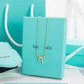 TIFFANY RIBBON NECKLACE BOW PENDANT DIAMOND CHARM CHAIN