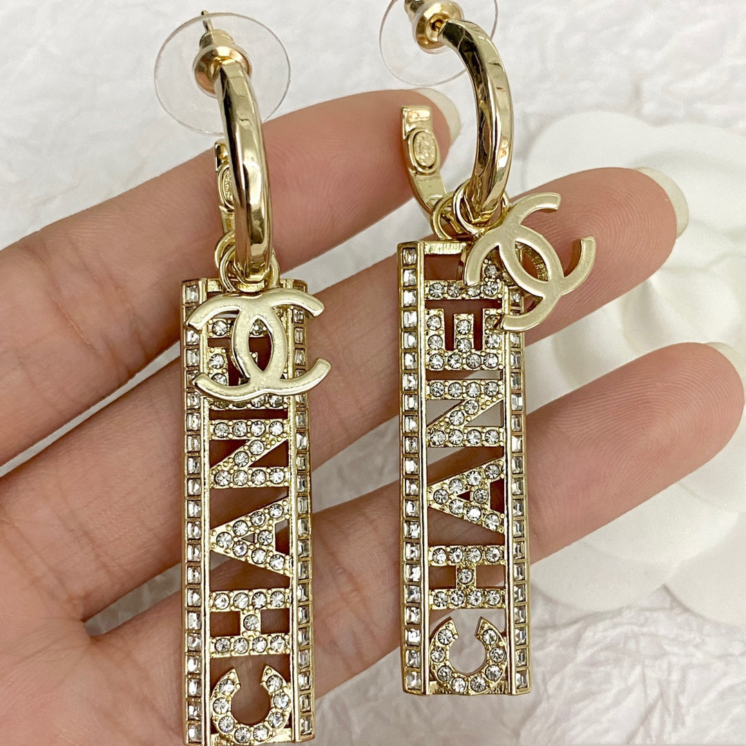 Chanel Text Diamond Paved Light Gold Drop Earrings