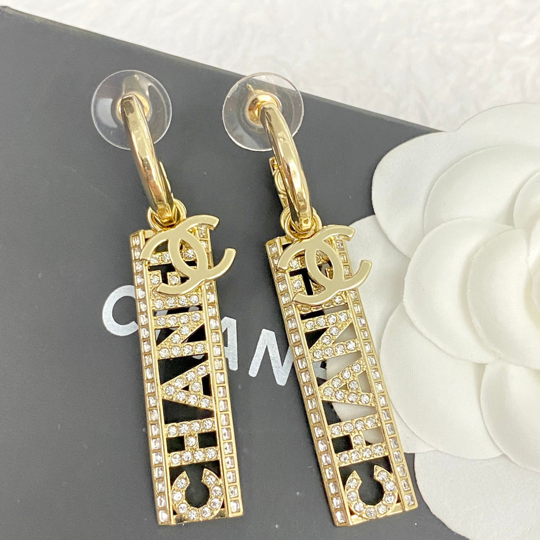 Chanel Text Diamond Paved Light Gold Drop Earrings