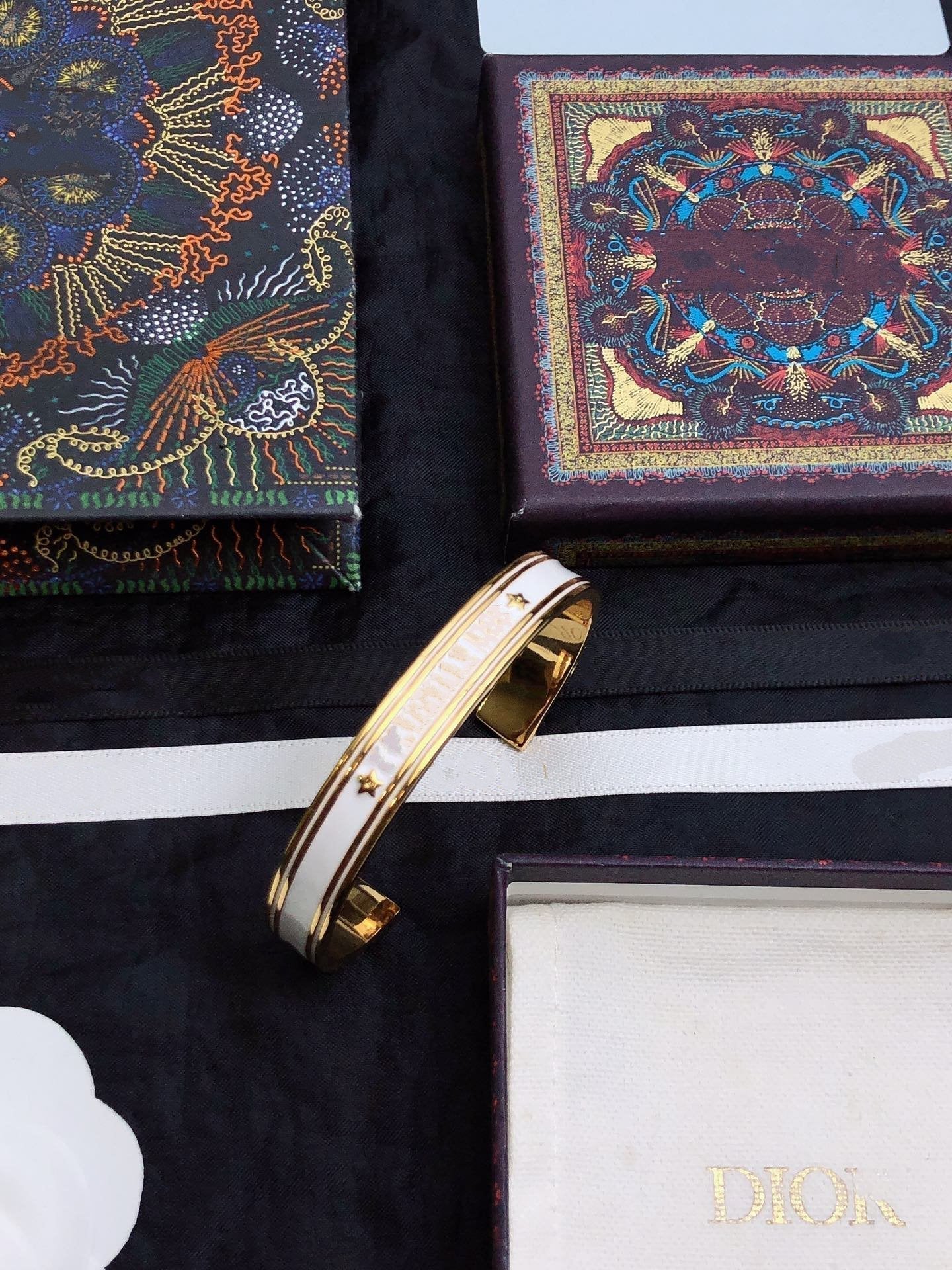 DIOR CODE BANGLE GOLD WHITE METAL AND LACQUER BRACELET