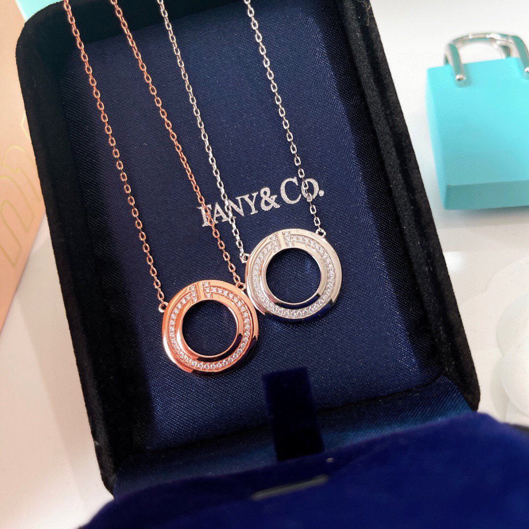 TIFFANY DIAMOND AND MOTHER OF PEARL CIRCLE PENDANT