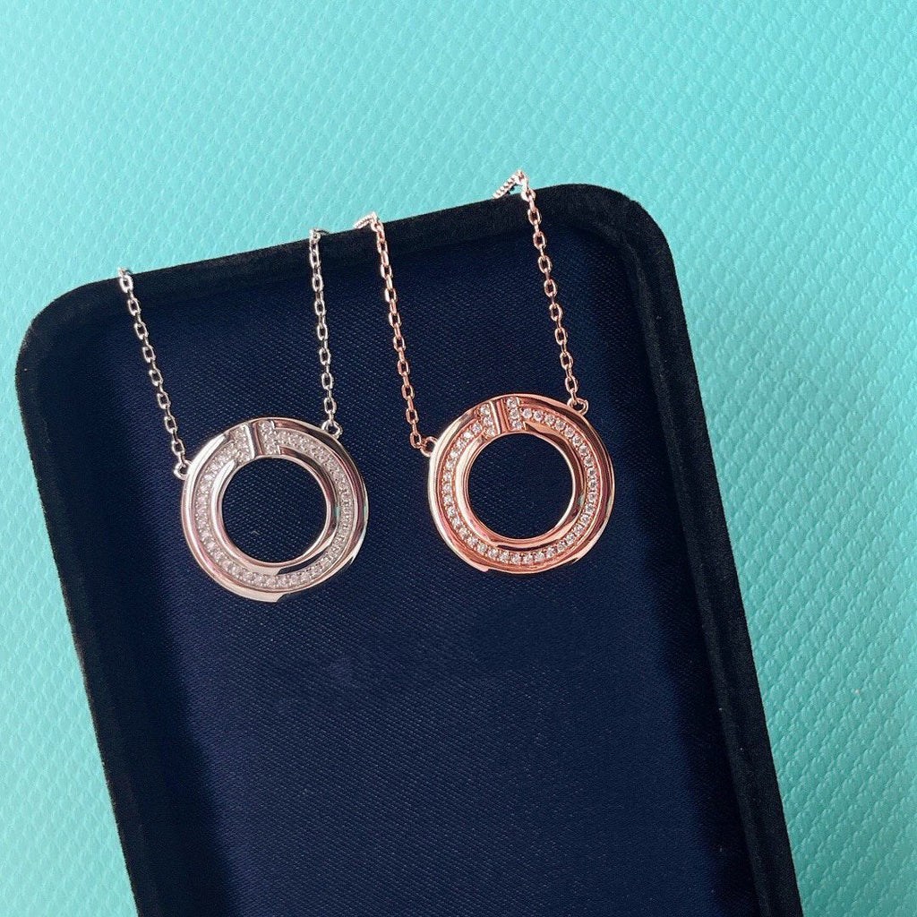 TIFFANY DIAMOND AND MOTHER OF PEARL CIRCLE PENDANT