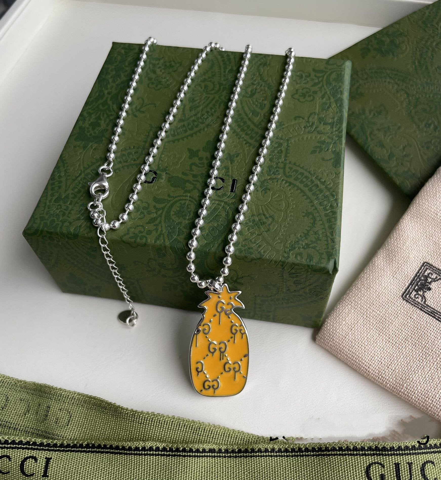 GUCCI GG NECKLACE PENDANT PINEAPPLE PATTERN