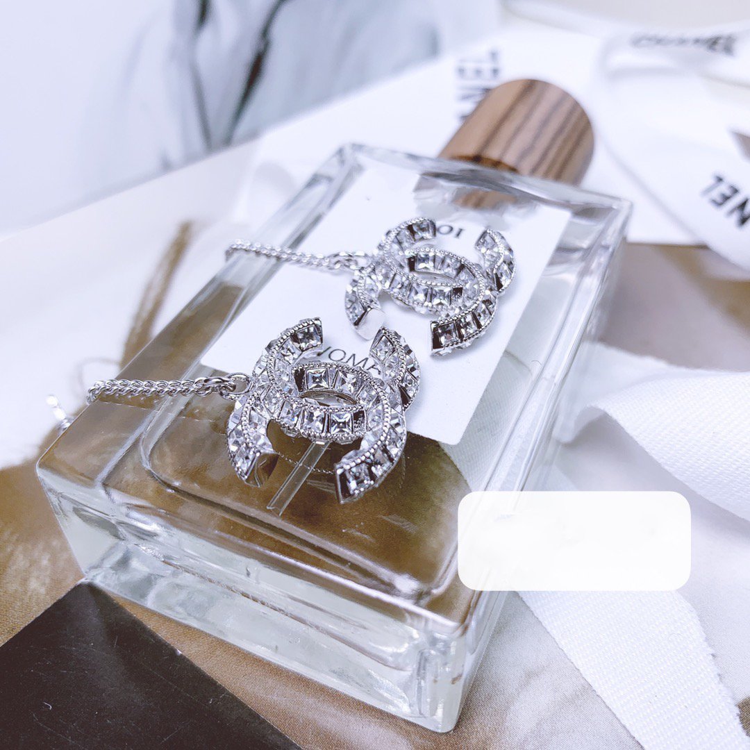 Chanel Double C Drop Silver Diamond Earrings