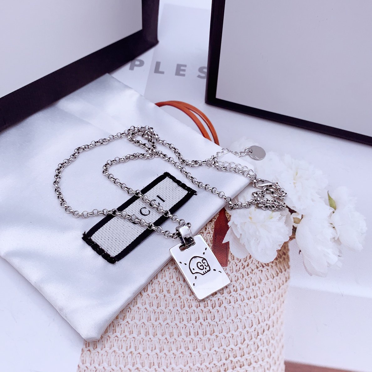 GUCCI GG GHOST STERLING SILVER SKULL NECKLACE