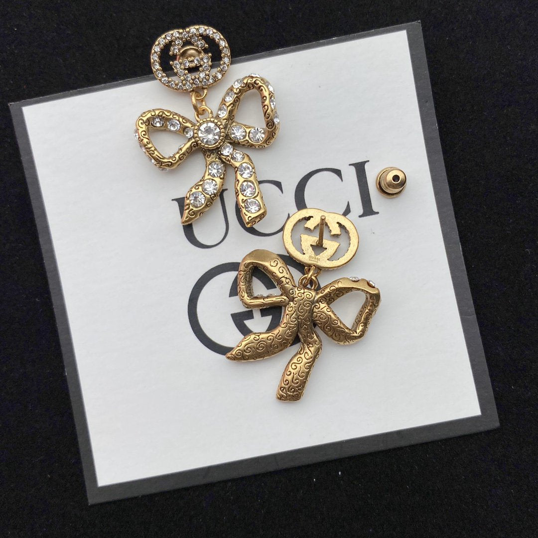 GUCCI GG BOW EARRINGS GOLD