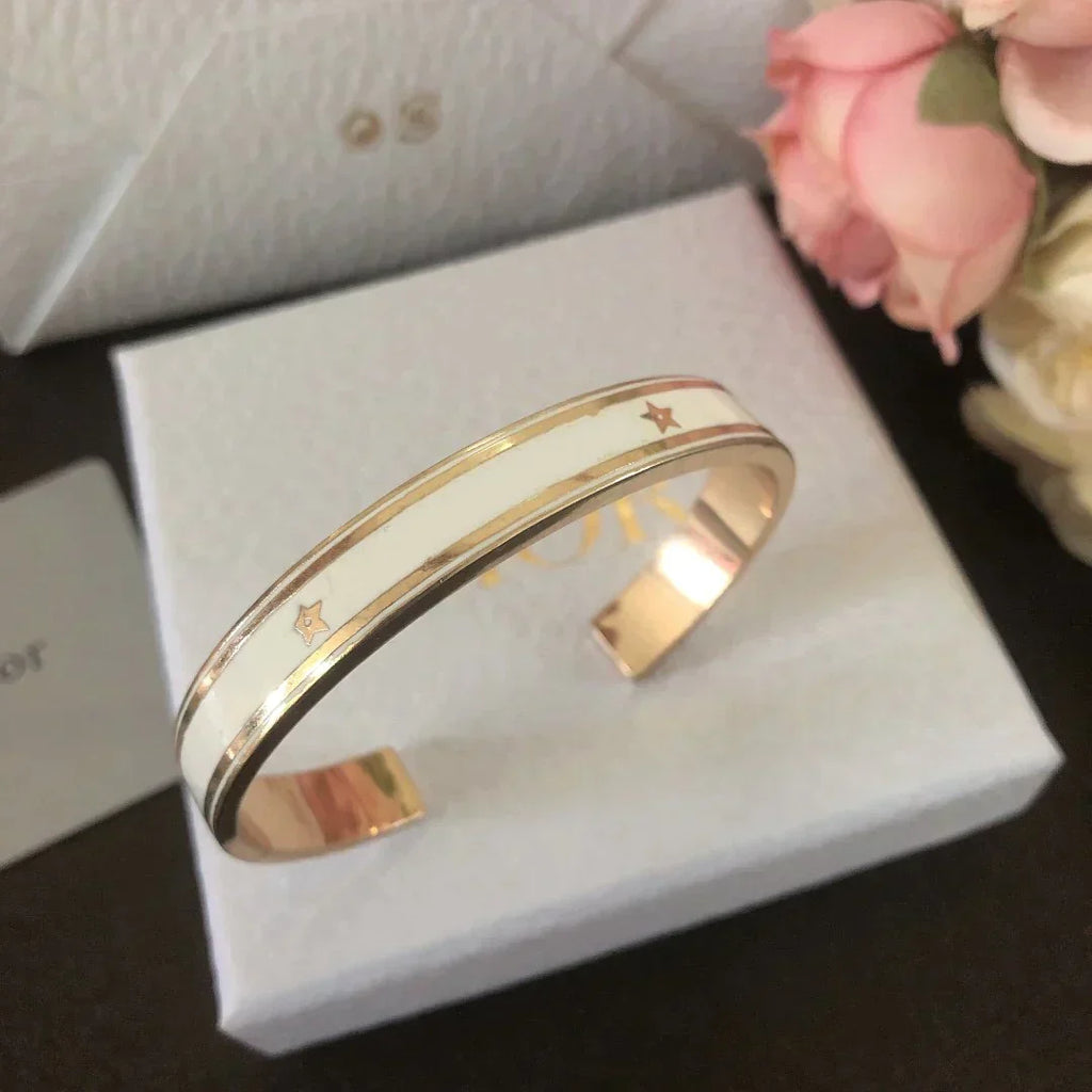 DIOR CODE BANGLE GOLD-FINISH METAL AND LACQUER WOMEN