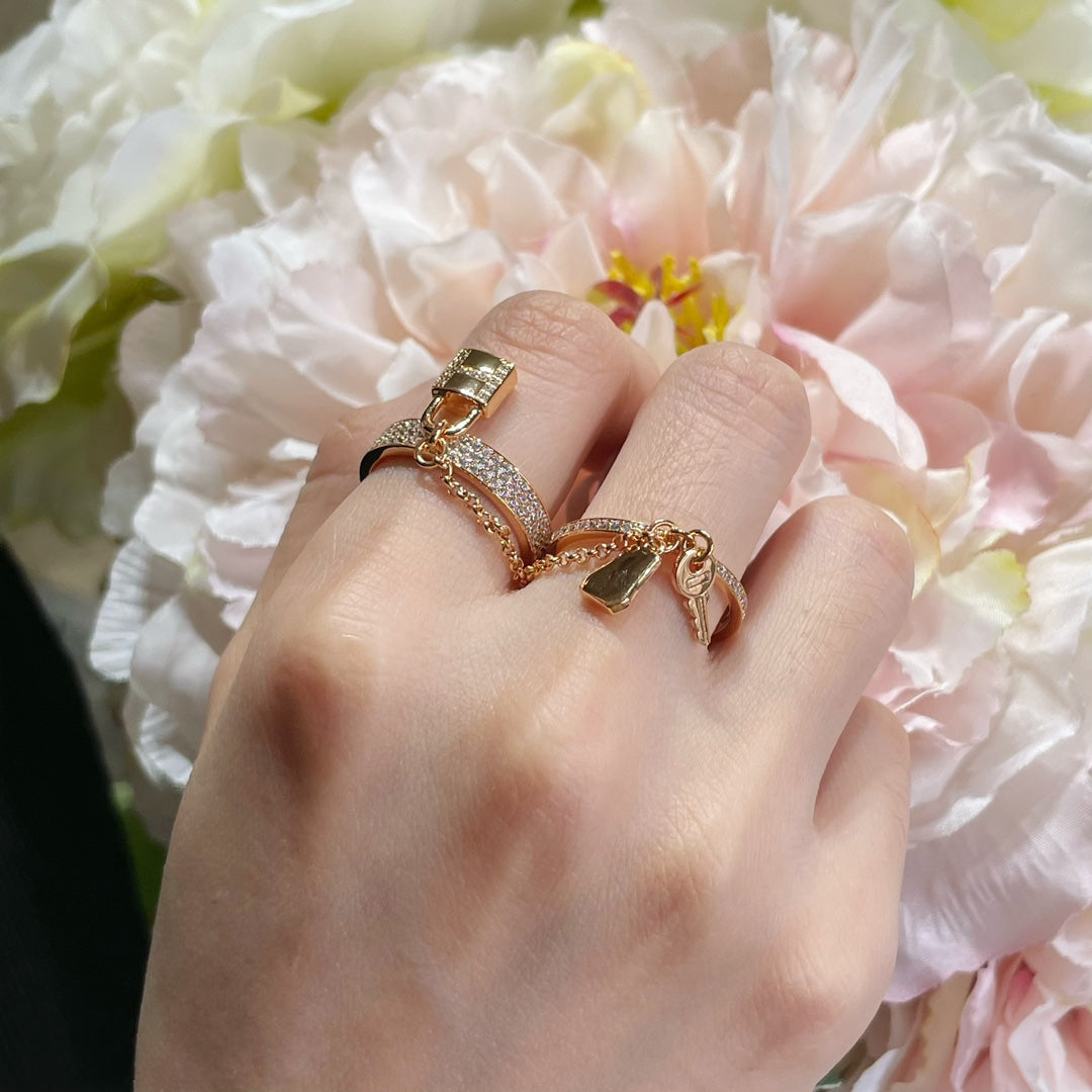 HERMES HM KELLY CLOCHETTE DOUBLE RING IN ROSE GOLD WITH DIAMONDS