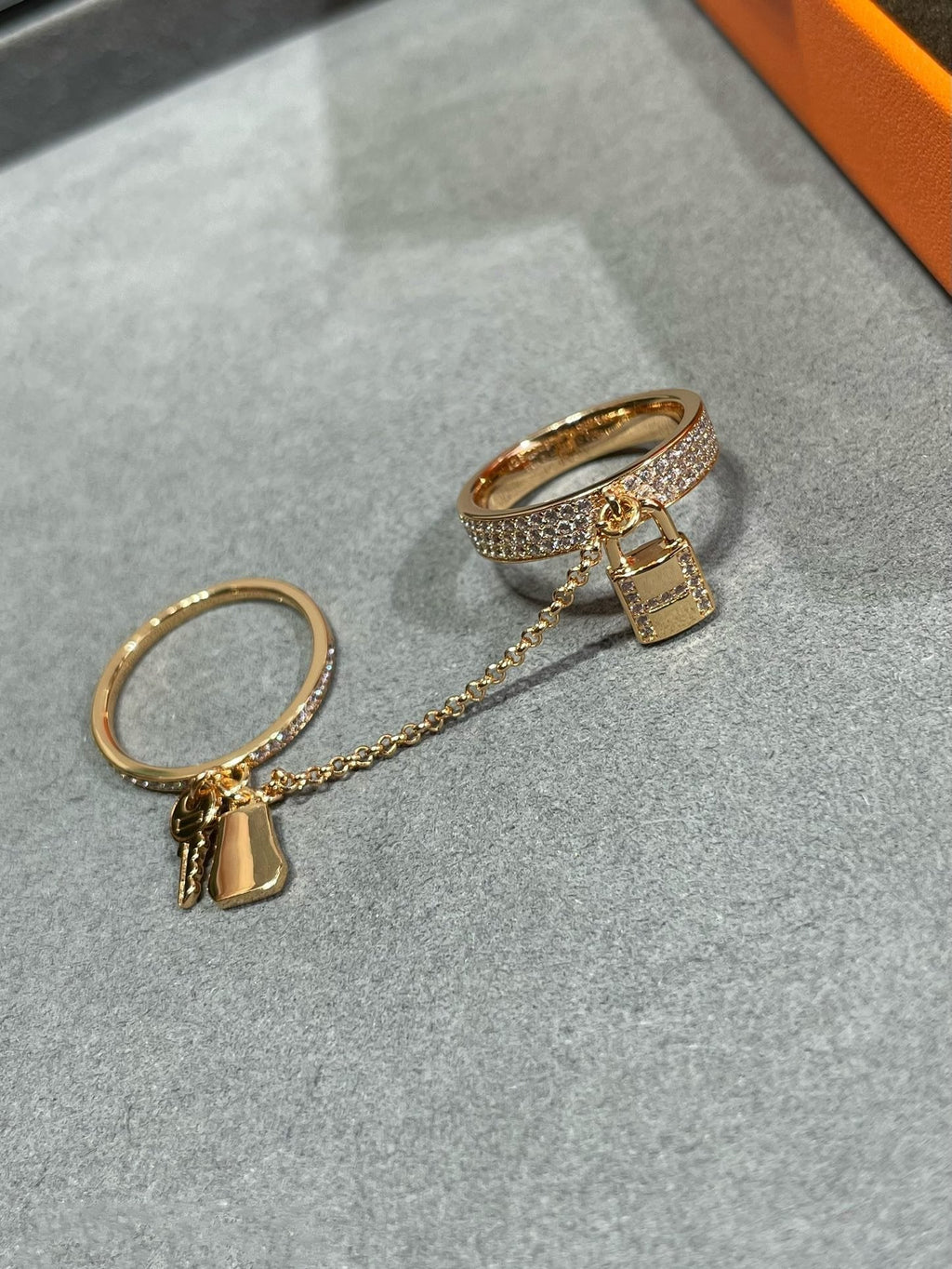 HERMES HM KELLY CLOCHETTE DOUBLE RING IN ROSE GOLD WITH DIAMONDS