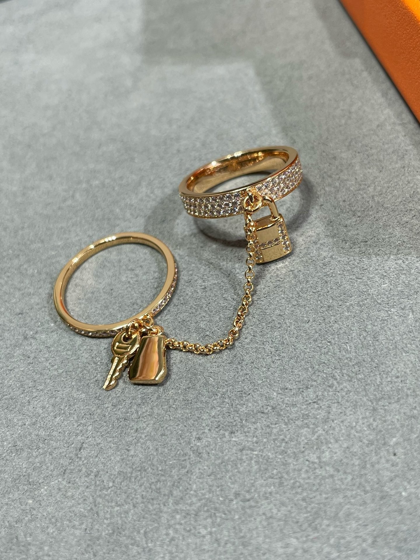 HERMES HM KELLY CLOCHETTE DOUBLE RING IN ROSE GOLD WITH DIAMONDS
