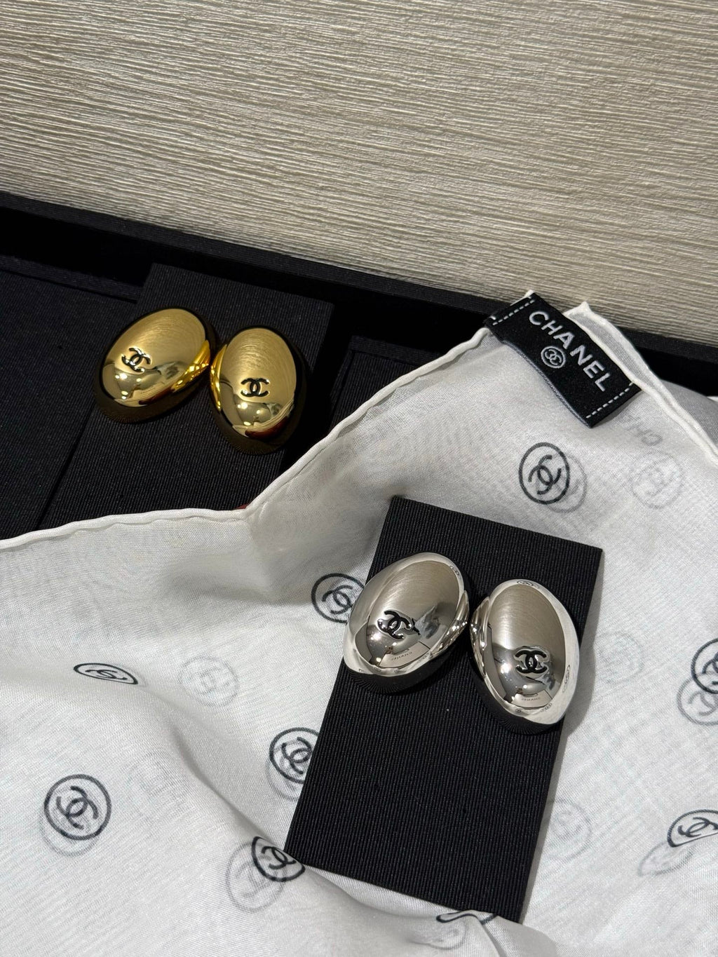 Chanel 2026 Mirror Black Enamel Double C Oval Pigeon Egg Earrings