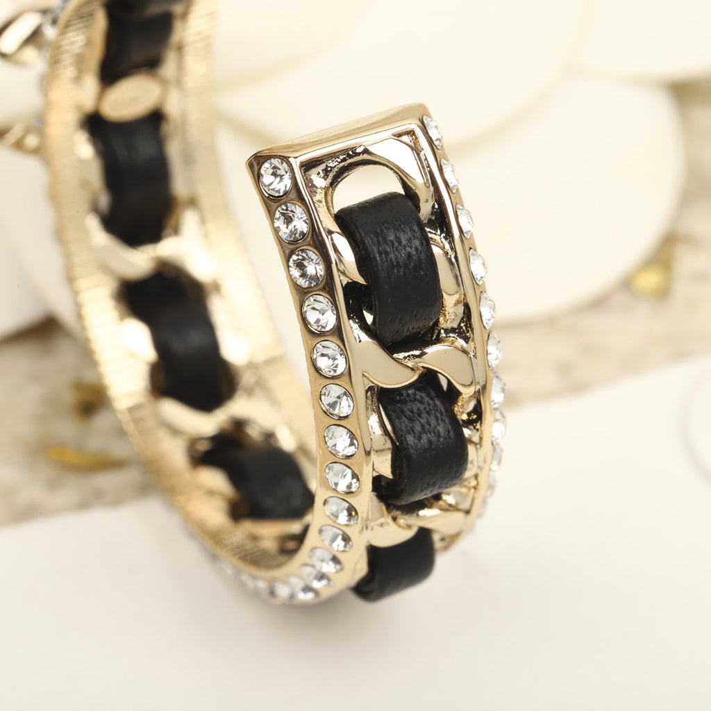 Chanel Double C Gold Leather Curved Hook Stud Earrings