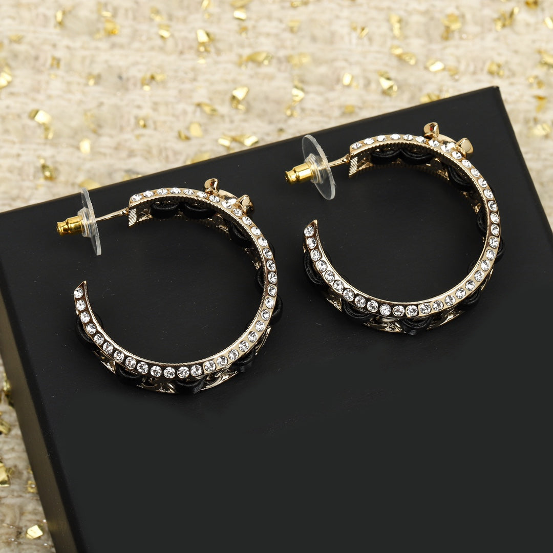 Chanel Double C Gold Leather Curved Hook Stud Earrings
