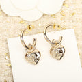 Chanel Double C Drop Heart Gold Earrings