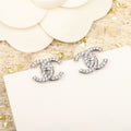 Chanel Double C Small Silver Diamond Earrings