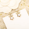 Chanel Double C Star Mop Diamonds Gold Earrings
