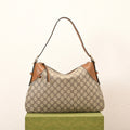 Gucci Emblem Medium Zip Tote Bag – 815217